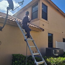 Pressure-washingPressure-Cleaning-a-residential-home-located-at-Boynton-Beach-FL-33472 2